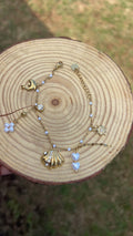 Bracelet fin doré coquillages